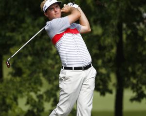 WEDDINGTON, NC - SEPTEMBER 28: Russell Henley hits his drive on the 11th hole during the second round of the Chiquita Classic held at The Club at Longview on September 28, 2012 in Weddington, North Carolina. (Photo by Michael Cohen/Getty Images)